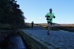 2012-saltergate-circuit-scarborough-and-ryedale-mountain-rescue-running-over-bridge
